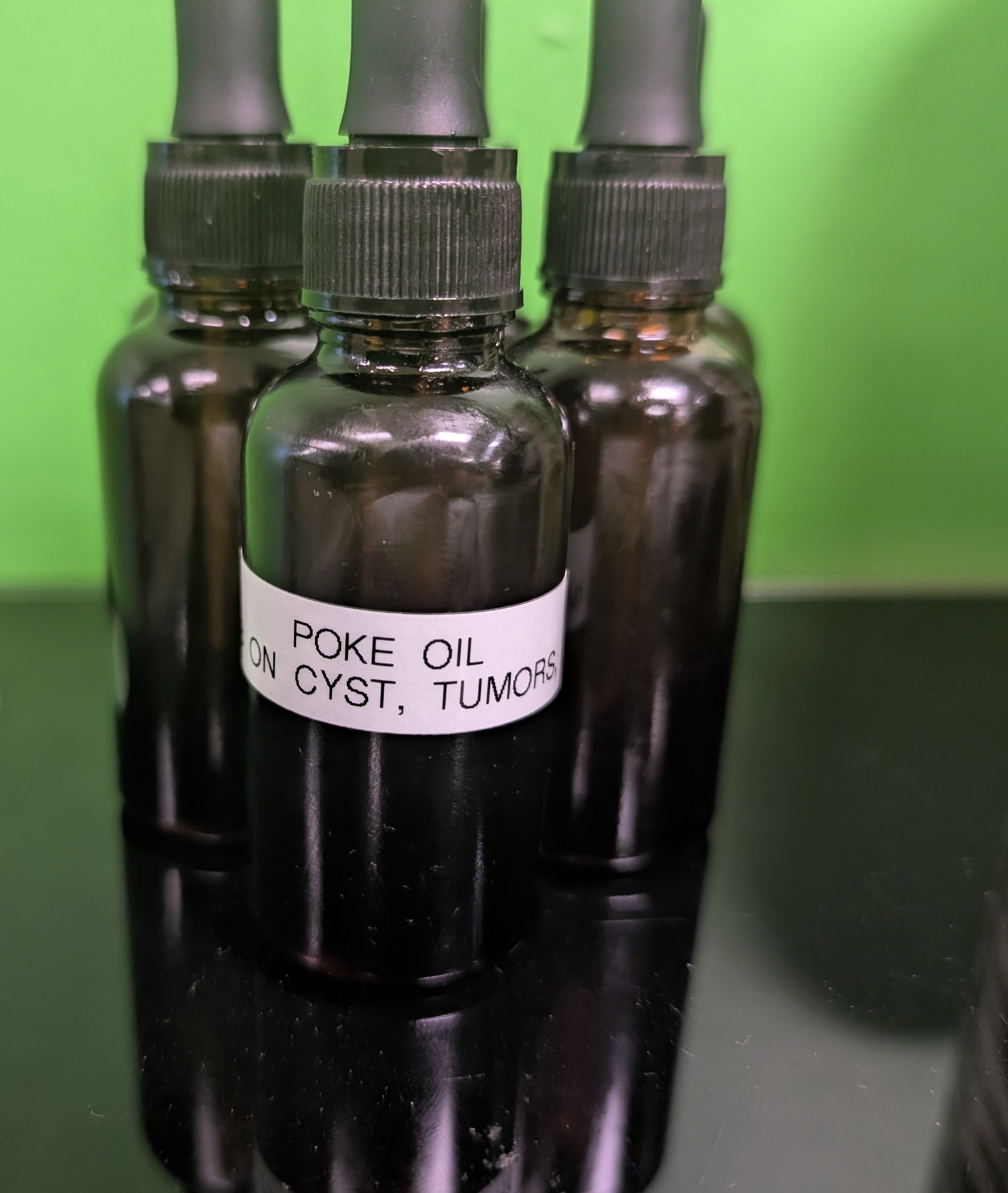 POKE ROOT OIL /Infused with Jamaican black castor oil